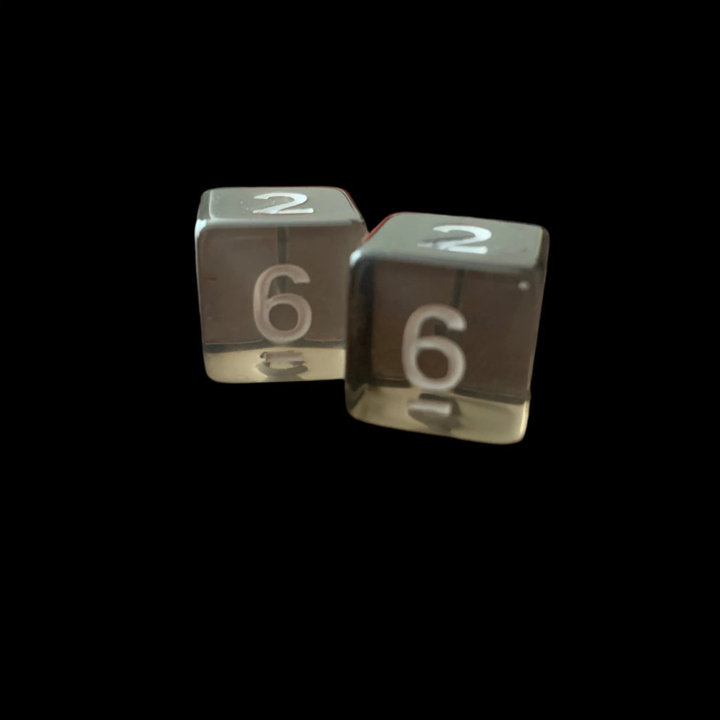 Two transparent dice with numbers on a black background