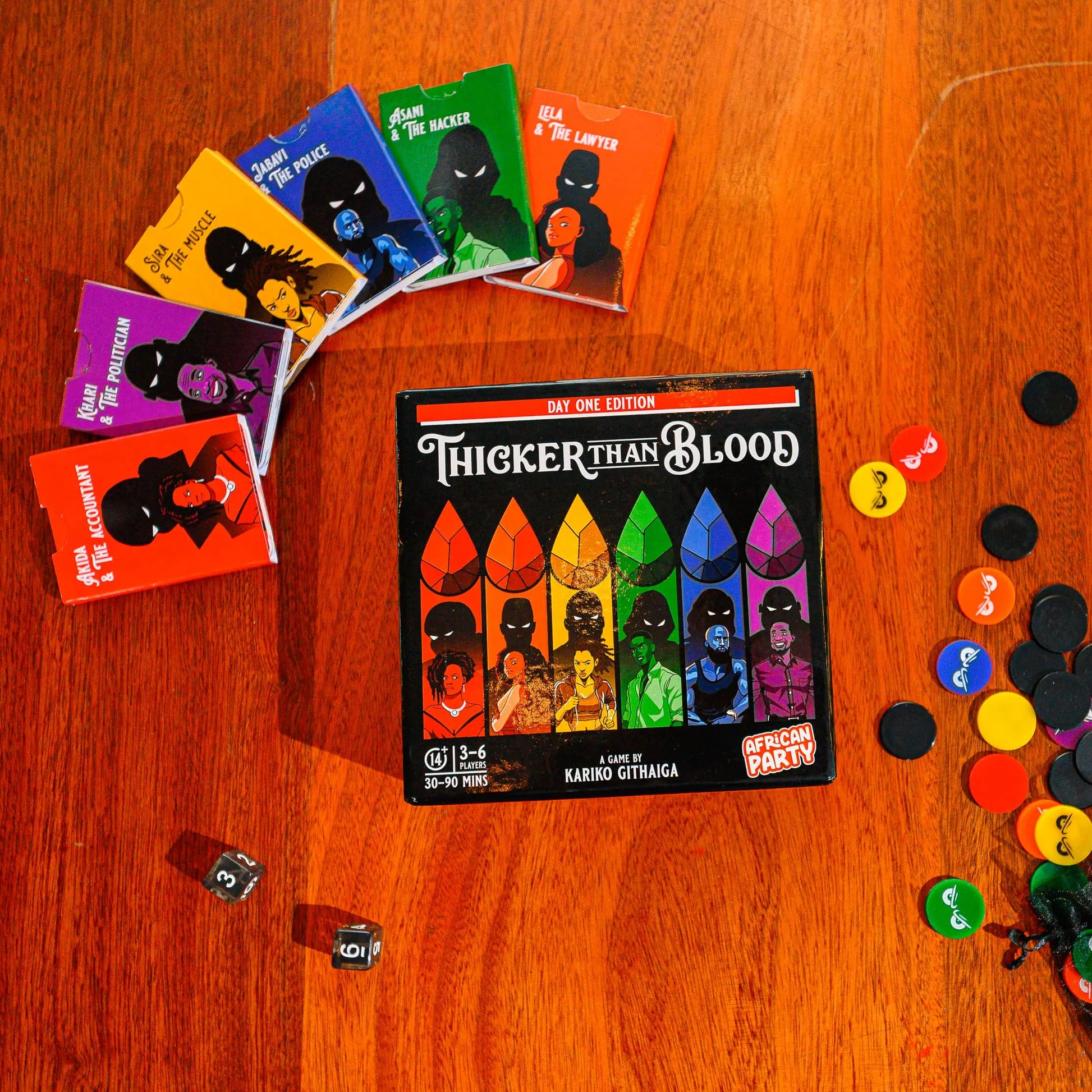 Board game 'Thicker Than Blood' with character cards and game pieces on a wooden surface